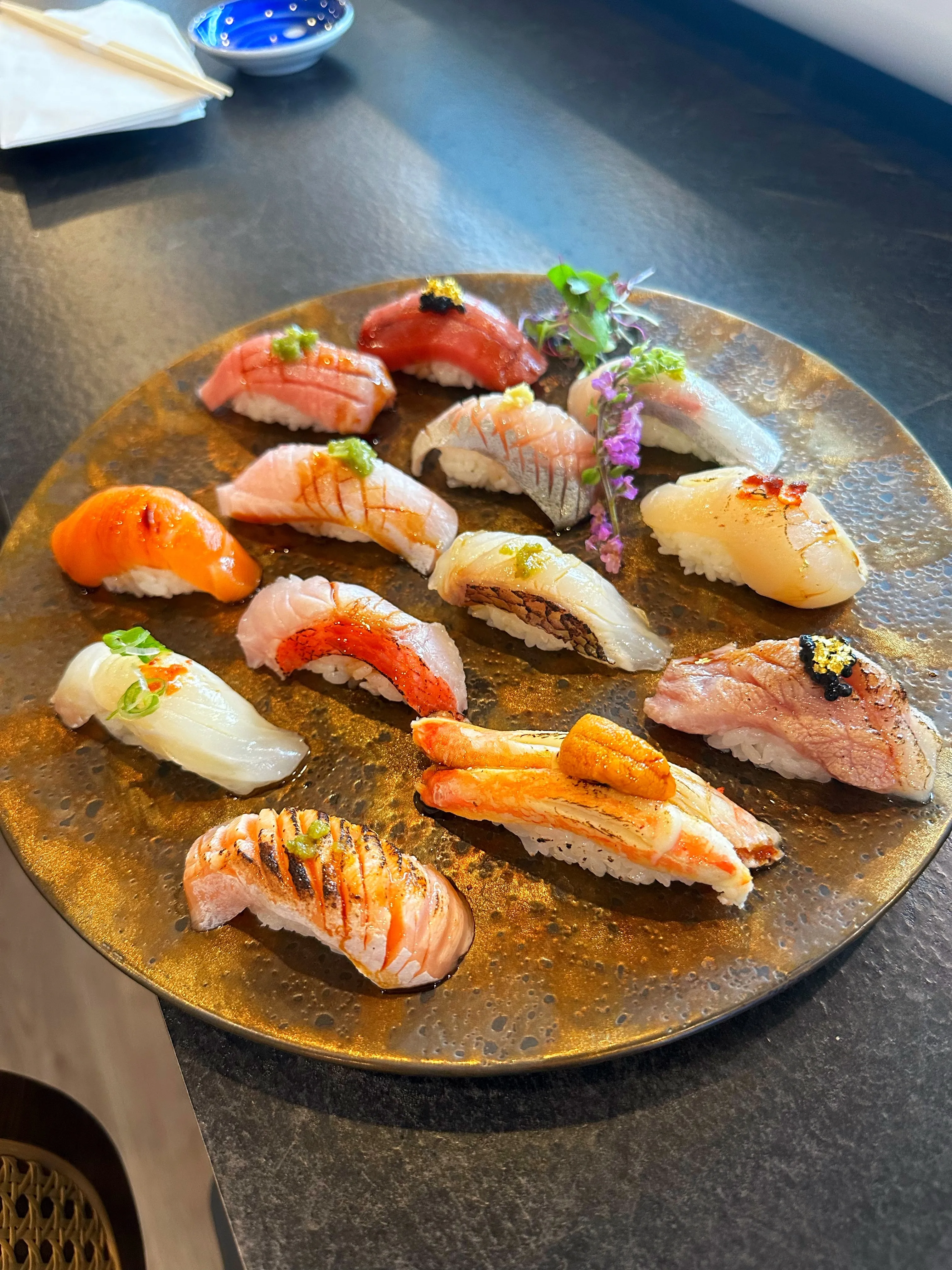 A 10-piece sushi combination featuring various fresh fish and perfectly seasoned rice at Sushi Yume Round Rock