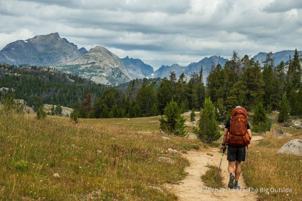 A backpacker hiking from Big Sandy north on the Continental Divide Trail toward Dads Lake, Wind River Range, Wyoming.
