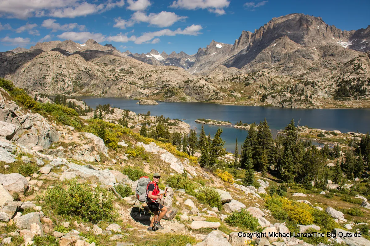 A backpacker hiking to Island Lake in Wyoming