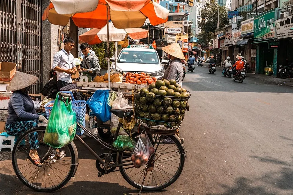 A bustling street food stall in Ho Chi Minh City (Saigon), Vietnam.
