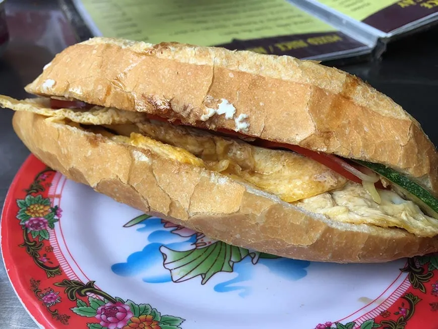A close-up of a delicious Vietnamese Banh Mi sandwich.