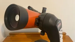 A close up view of the fork arm mount on the Celestron NexStar 4SE amateur astronomy telescope