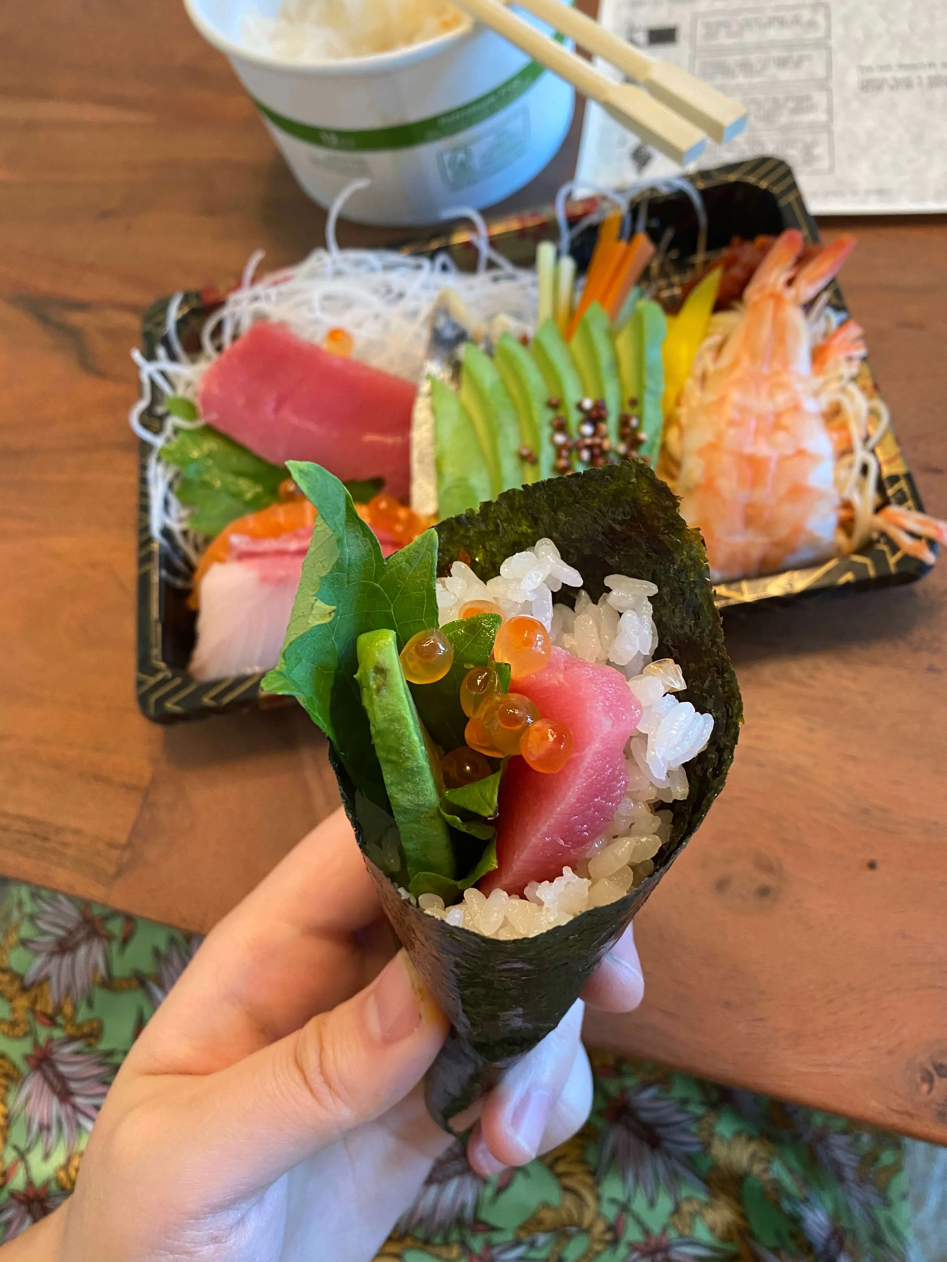 A collection of completed handrolls in stands at Uroko, ready to be enjoyed