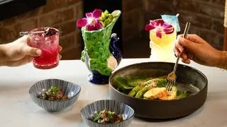 A colorful Poke bowl dish at Sugar Salt Sand, showcasing fresh ingredients typical of Hawaiian cuisine available near Denver.