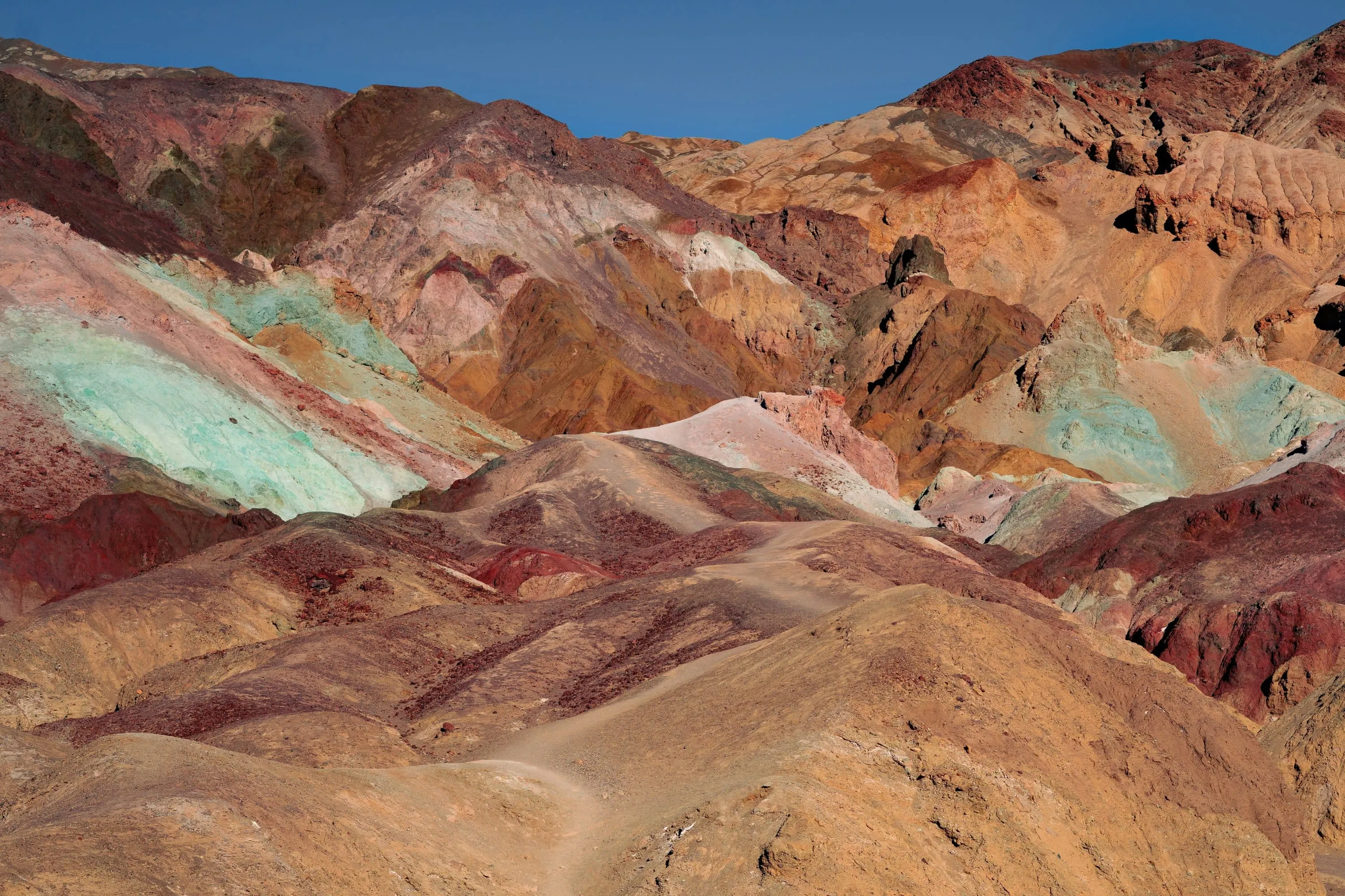 A colorful variety of desert mountain peaks
