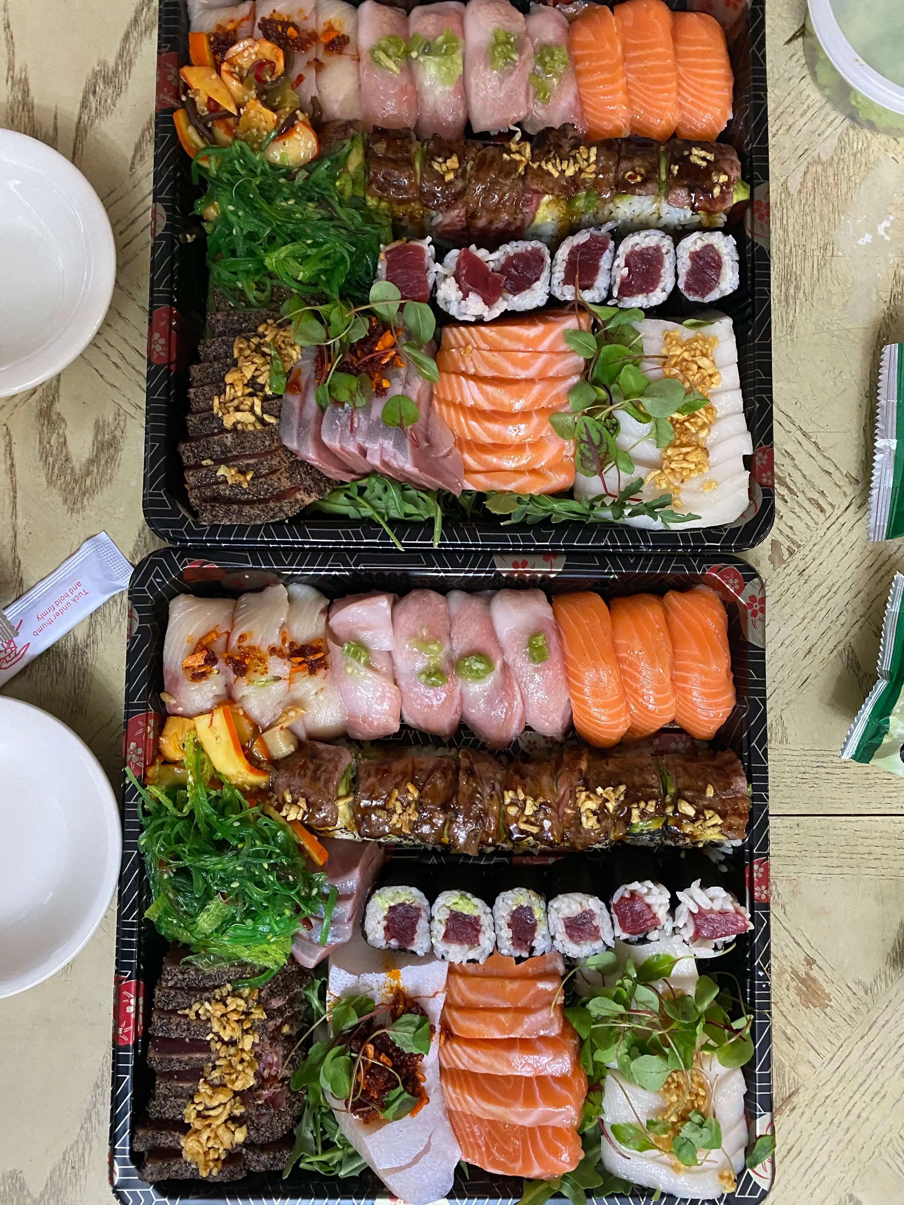 A curated sushi platter with various rolls and nigiri from Chef Teddy's private sushi service in Austin