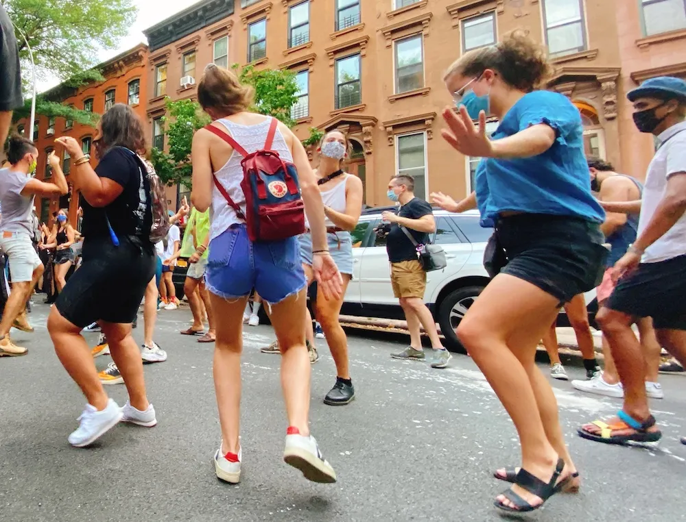 A festive scene at a 'sort-of-secret' block party in Brooklyn, a truly unique local experience.
