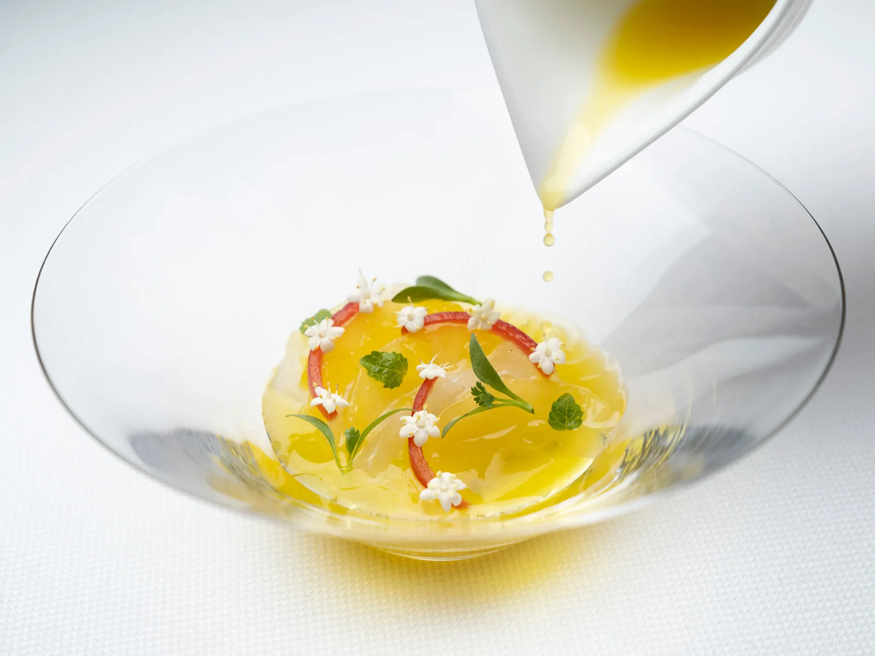 A finely plated French dish from Jean-Georges, demonstrating the restaurant's commitment to elegant presentation and sophisticated cuisine.