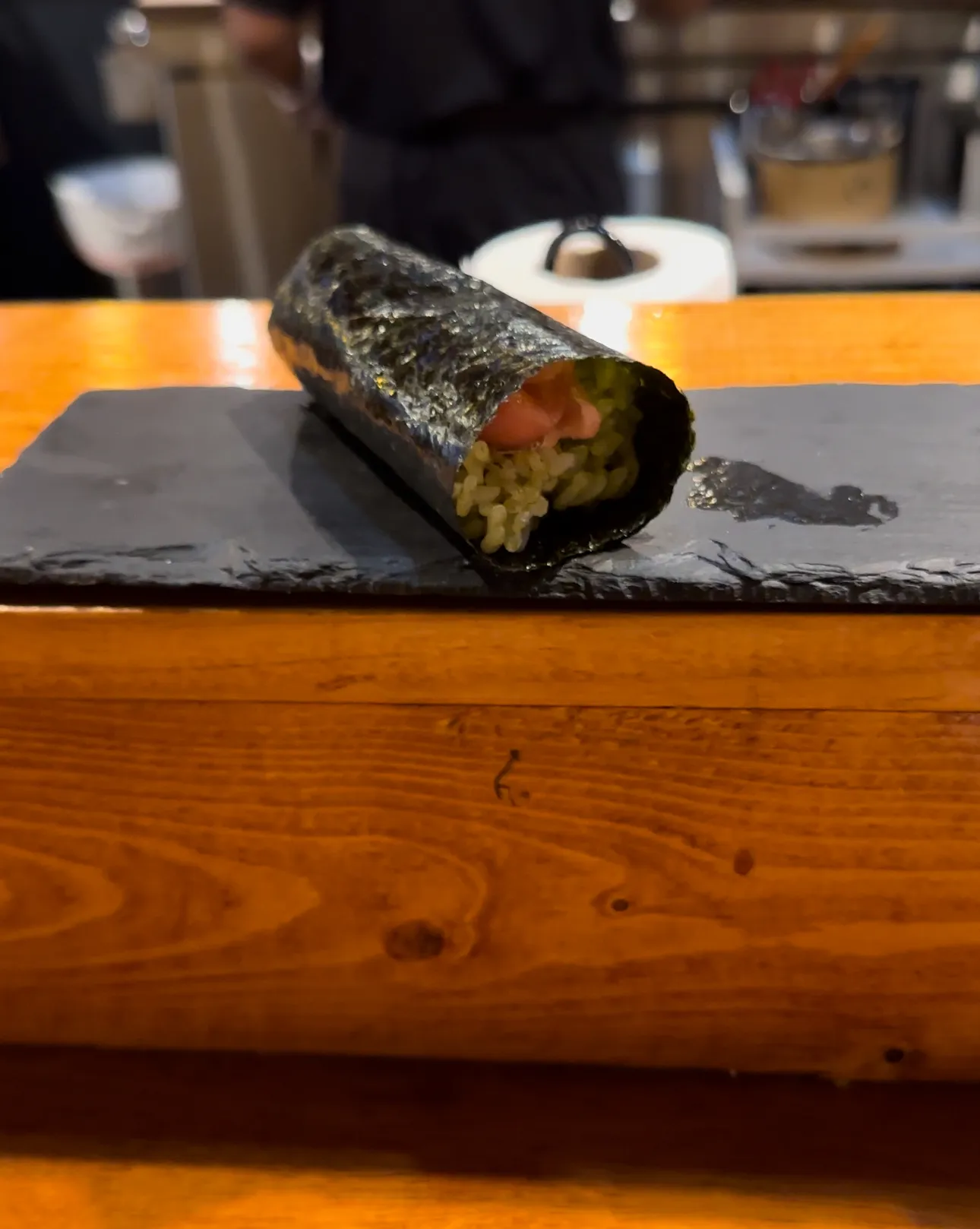 A fresh handroll being served at Yuki ATX, a popular handroll bar in Austin