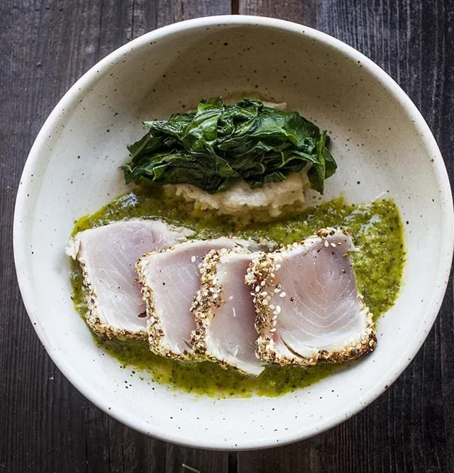 A plate of beautifully presented sustainable seafood from Passionfish, highlighting their commitment to fresh, responsible dining.
