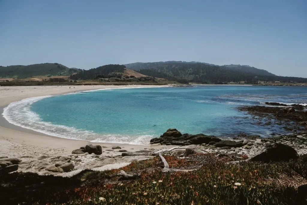 A scenic view of the California coastline near Carmel By The Sea, hinting at the source of fresh seafood and produce.