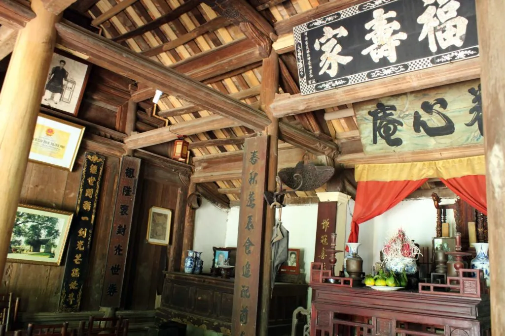 A traditional house with curved roof tiles in Duong Lam Ancient Village