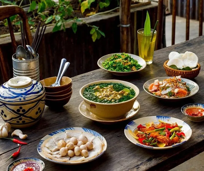 A typical Vietnamese family meal illustrating What Do People Eat In Vietnam daily