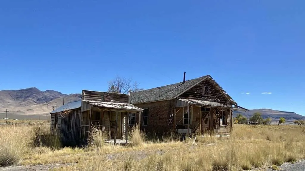 Abandoned buildings along a street in Wendel, California ghost town near Reno