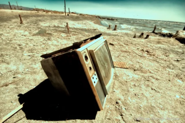 Abandoned structures and art pieces on the beach near the Salton Sea