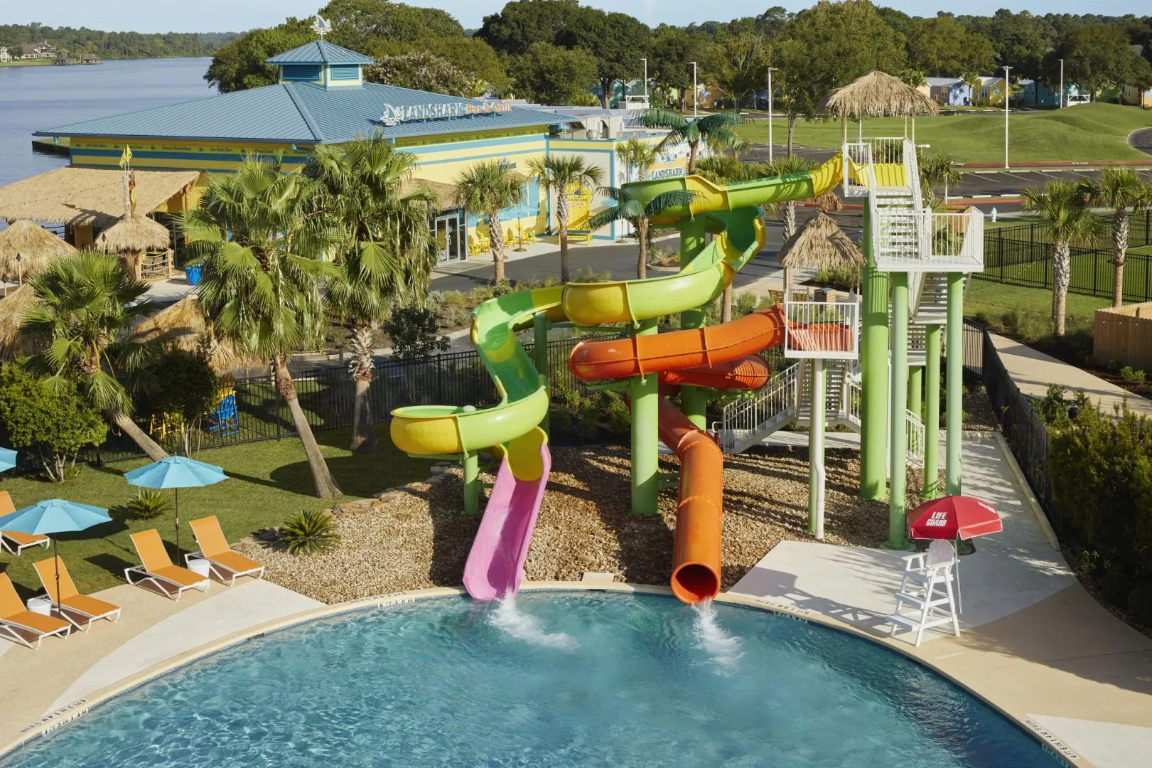 Aerial view of Margaritaville Lake Resort pool complex and lake