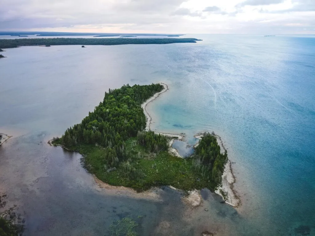 Aerial view of the Les Cheneaux Islands area with boats
