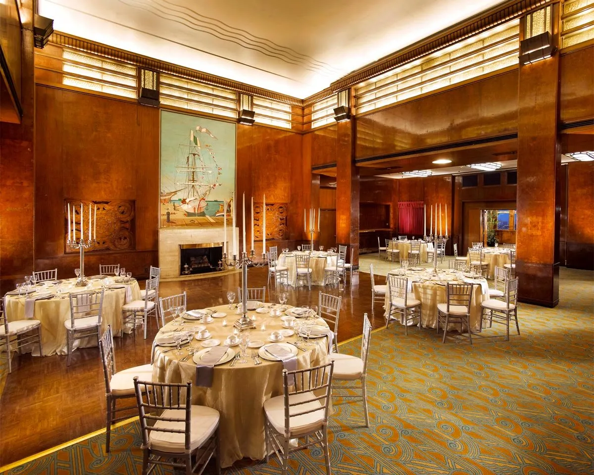 alt text: An Art Deco hotel room aboard The Queen Mary, highlighting unique accommodation options near Los Angeles.