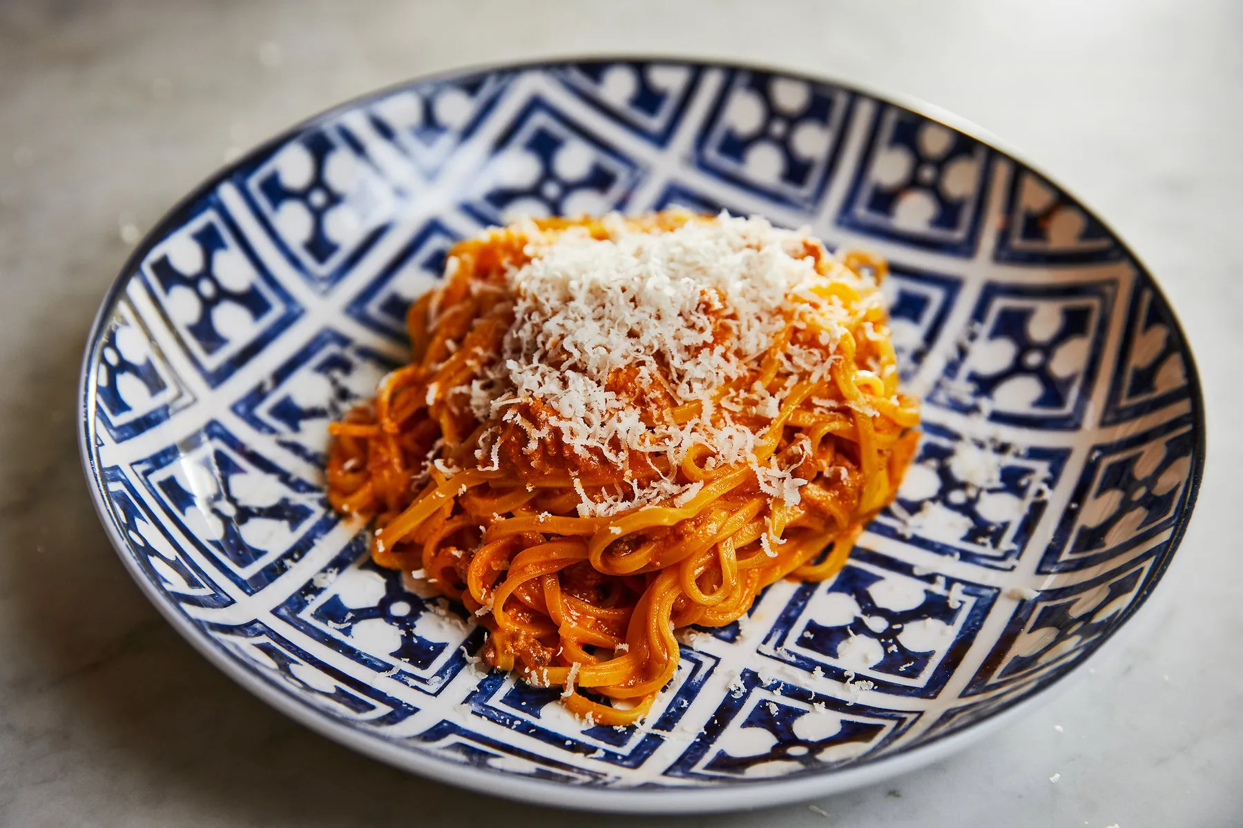 An assortment of fresh pasta dishes from Rezdôra, showcasing different shapes and sauces representative of Emilia-Romagna.