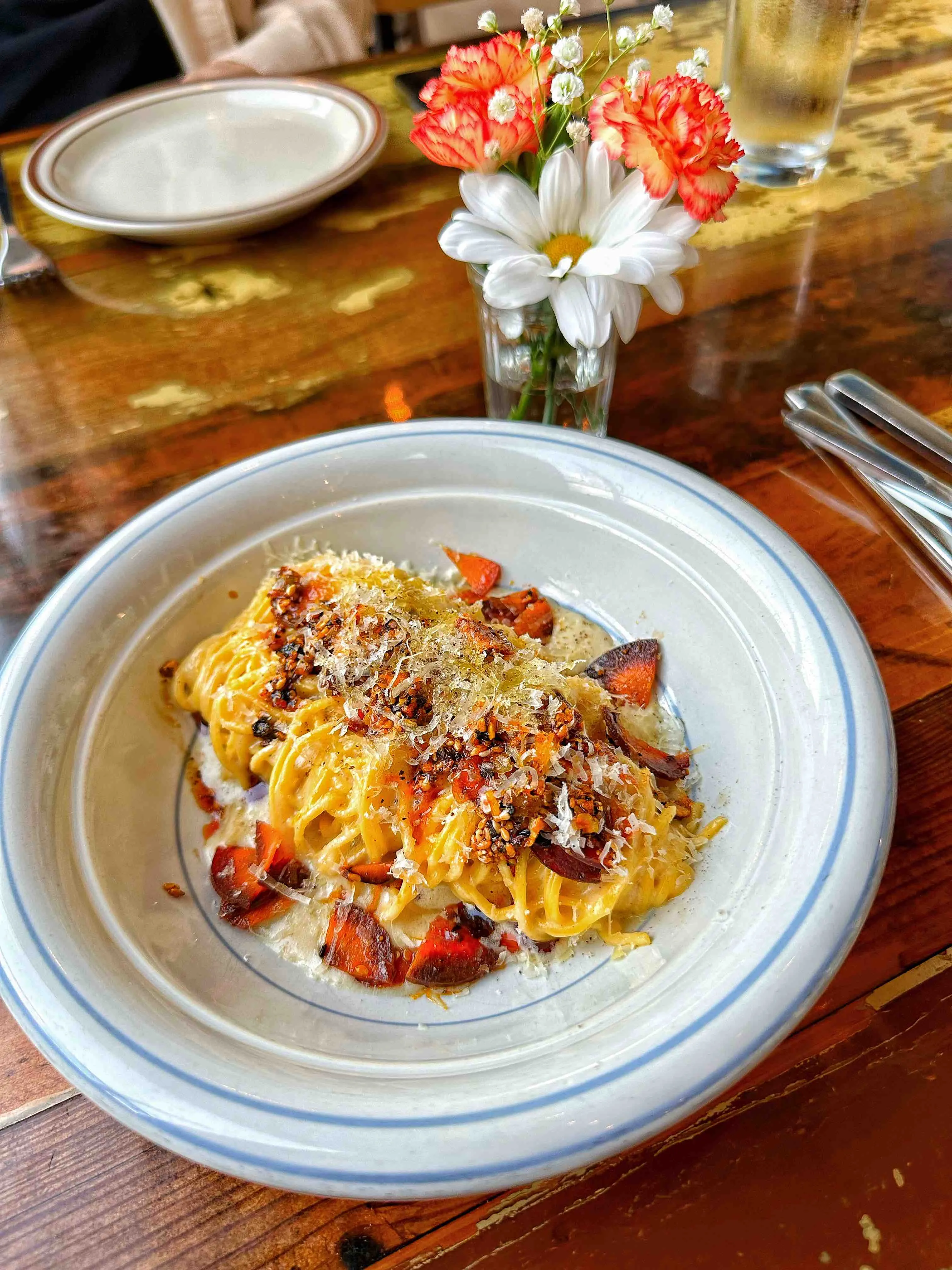 Artfully plated dish featuring local ingredients at Odd Duck in Austin