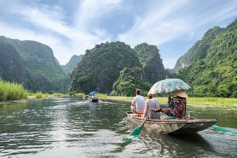 Beautiful Perfume Pagoda complex nestled in a limestone mountain range, a spiritual journey experience