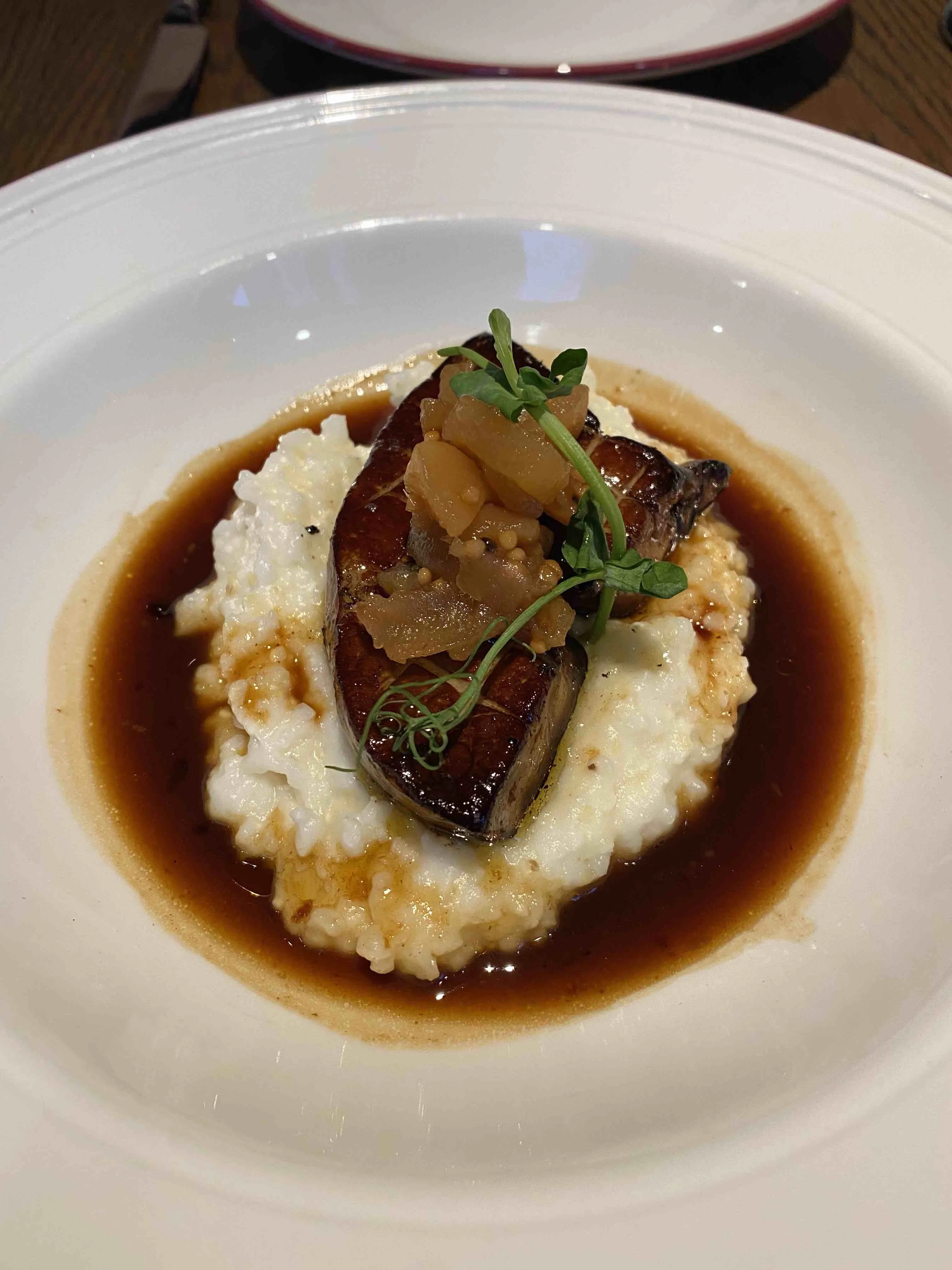 Beautifully presented seafood dish from Diner Bar Austin, showcasing Southern French fusion