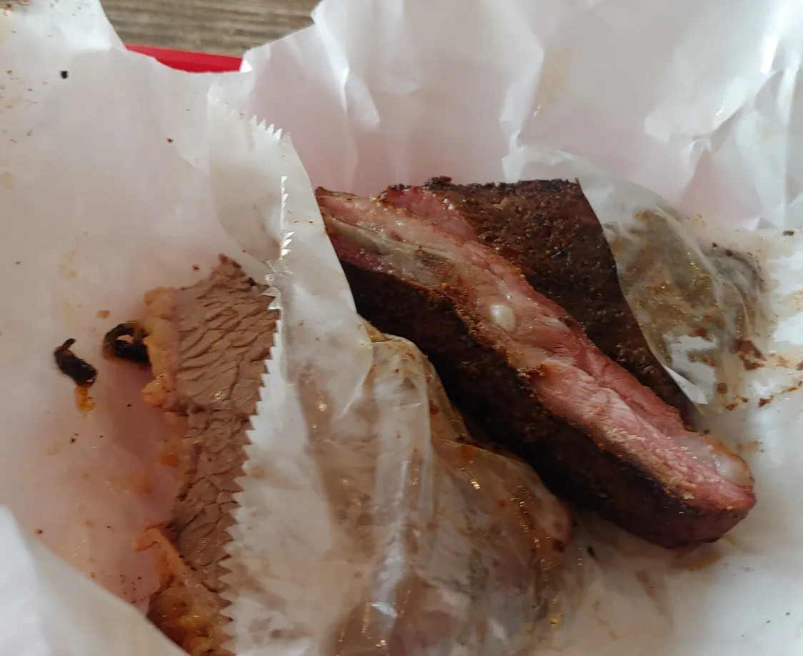 Brisket and Ribs from Rudy's BBQ, classic Texas meats when deciding what to eat in san antonio texas