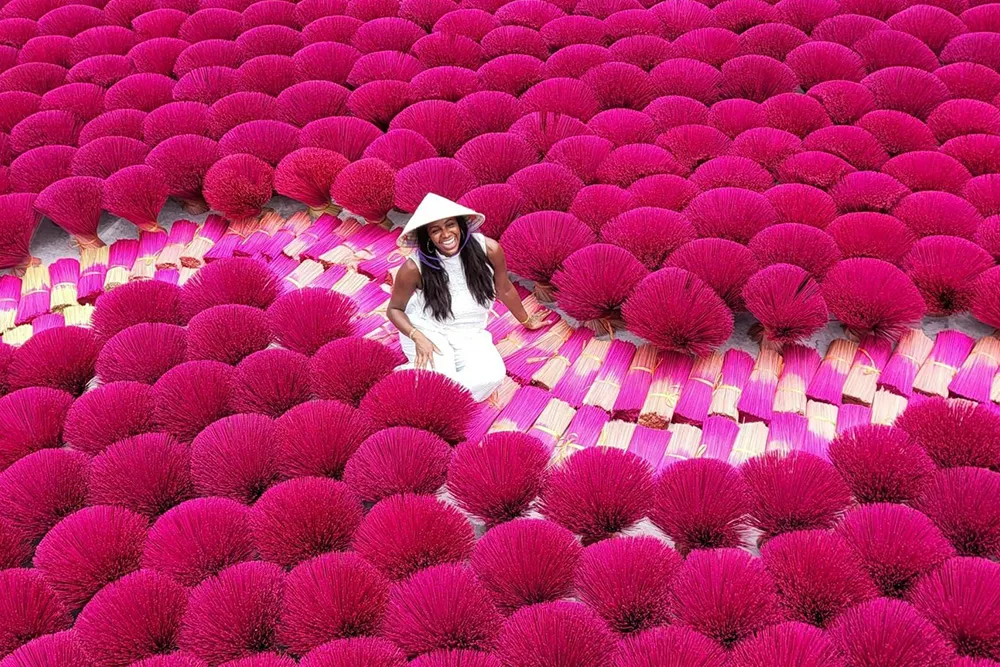 Bundles of red incense drying at Quang Phu Cau Incense Village near Hanoi, Vietnam