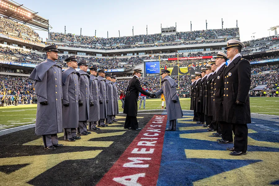 Cadets on the field during the Army-Navy Football Game, a major sports tradition near DC to experience when you Travel To Washington Dc In December.