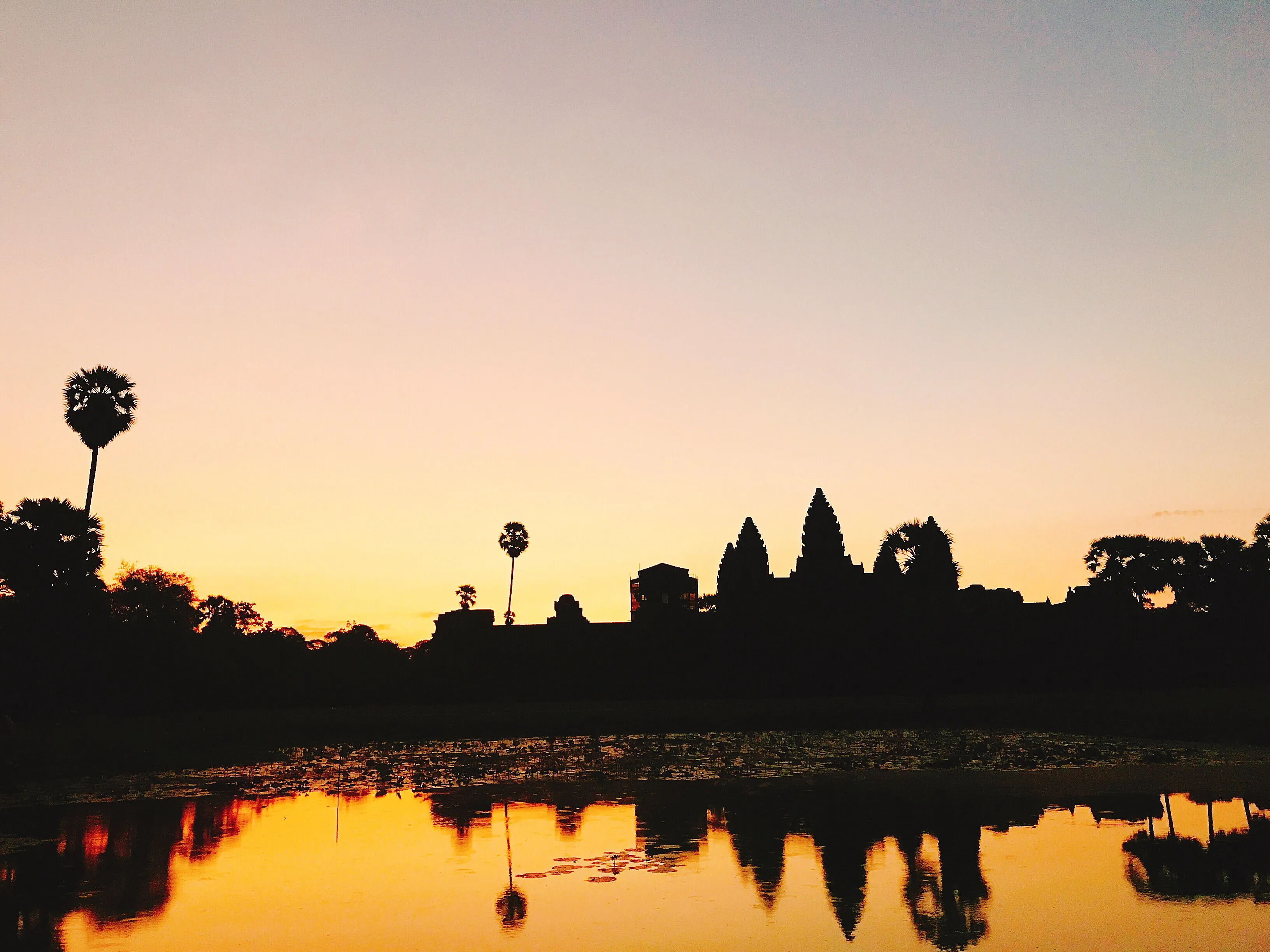 Capturing sunrise over the ancient towers of Angkor Wat, Cambodia