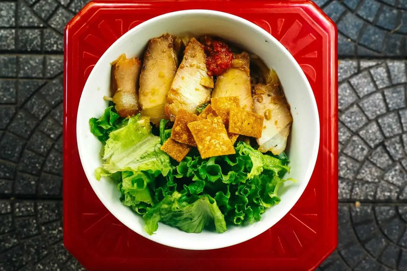 Cau Lau – a dish native to Hoi An. Try it at least once during your visit. Photo: Agnuush Monstar