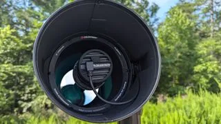 Celestron Origin intelligent home observatory telescope with trees in the background