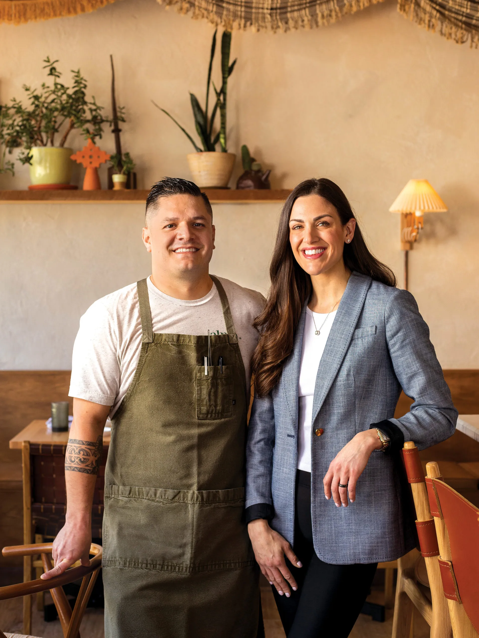 Chef Johnny Curiel and Kasie Curiel, owners of Alma Fonda Fina, pose together in their restaurant.