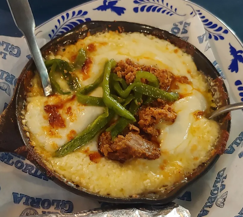 Chorizo Con Rajas appetizer at La Gloria, a rich starter when deciding what to eat in san antonio texas