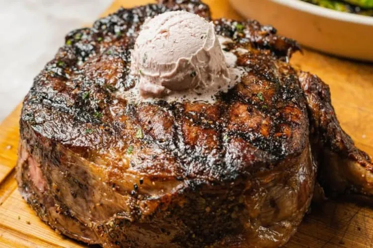 Close-up of a bison ribeye steak with chimichurri sauce, a fine dining option for what to eat near Arlington TX