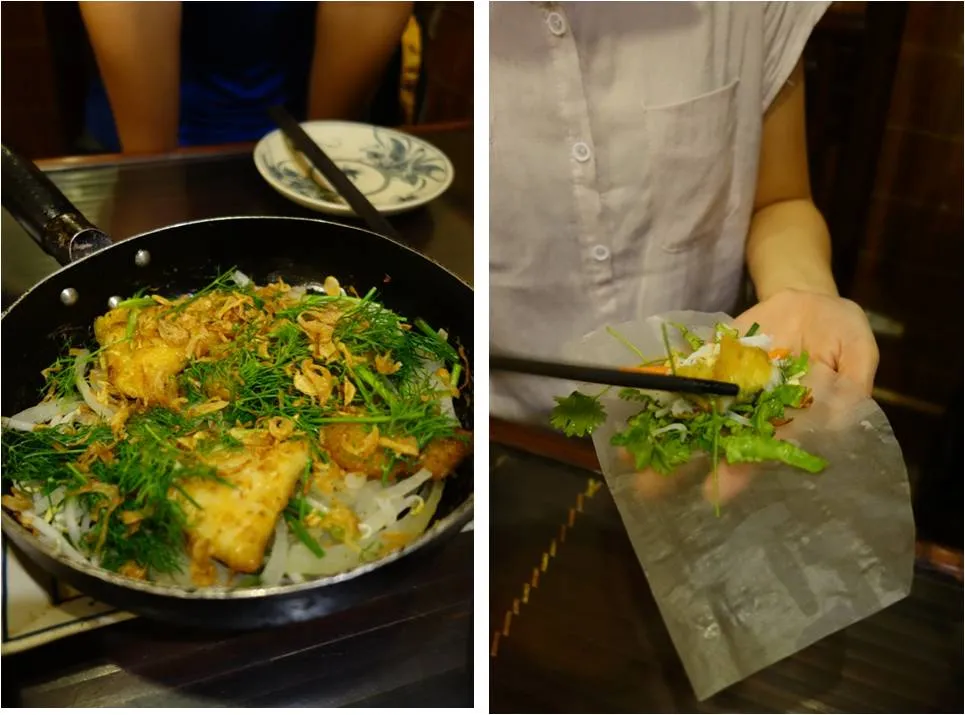 Close-up of fried snakehead fish pieces with dill, served with fresh herbs, noodles, and wrapping components