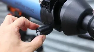 Close-up of the focusing knob on the Celestron Inspire 100AZ amateur telescope