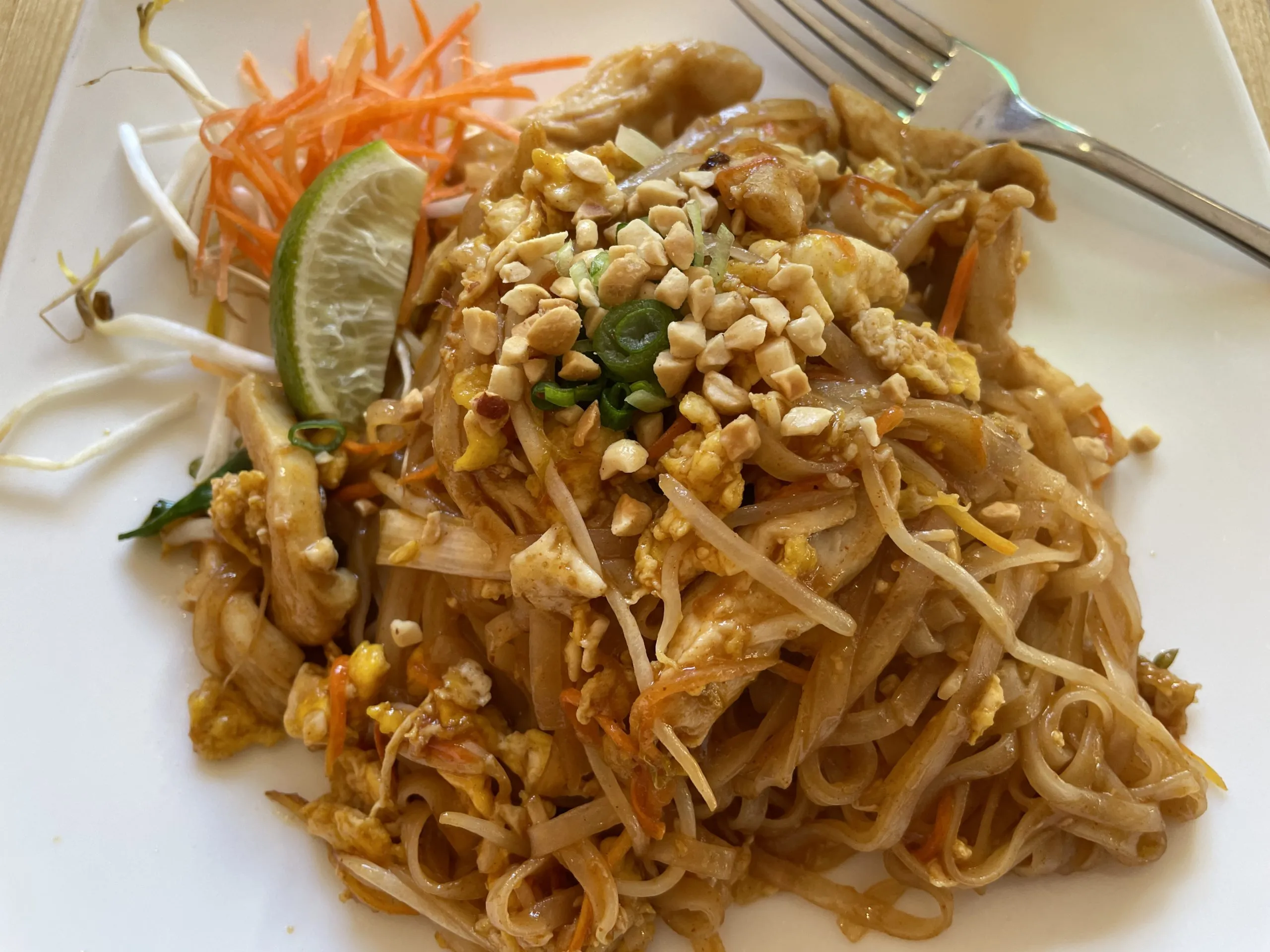 Close-up view of Chicken Pad Thai noodles at Grub Thai