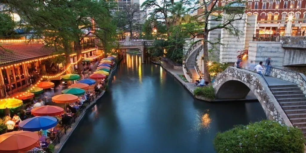 Colorful buildings along the San Antonio Riverwalk, a classic romantic spot for honeymoons