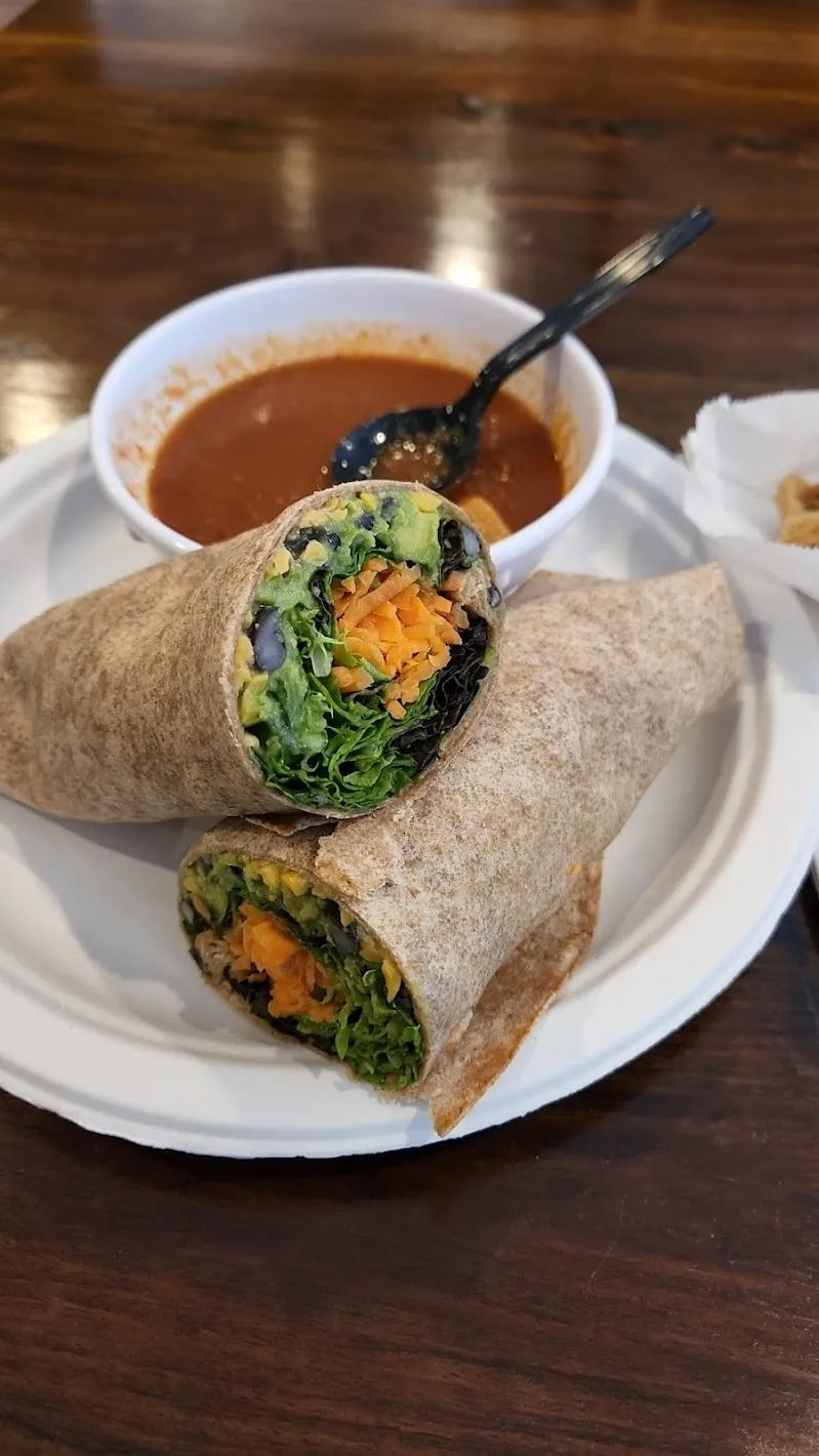 Colorful interior and delicious breakfast tacos at Thistle Cafe in Austin