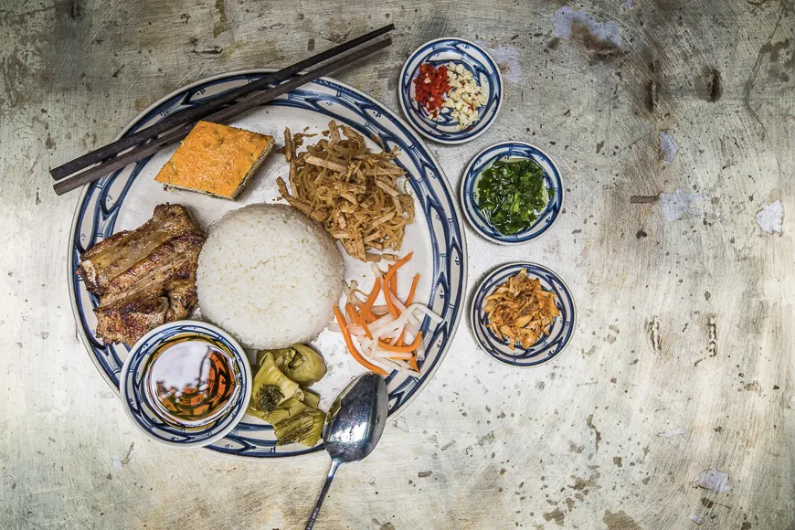 Com Tam, Vietnamese broken rice dish with grilled pork chop and fried egg