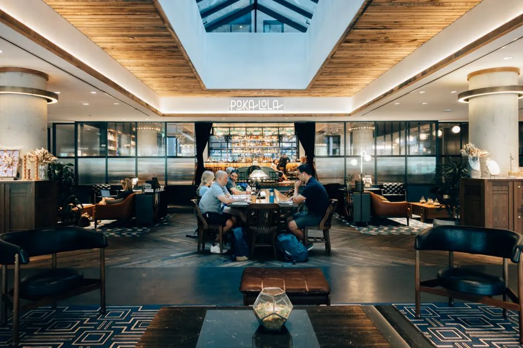 Communal work area in the lobby of the Maven Hotel