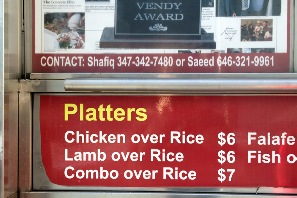 Contact information sign on Sammy's Halal Food cart