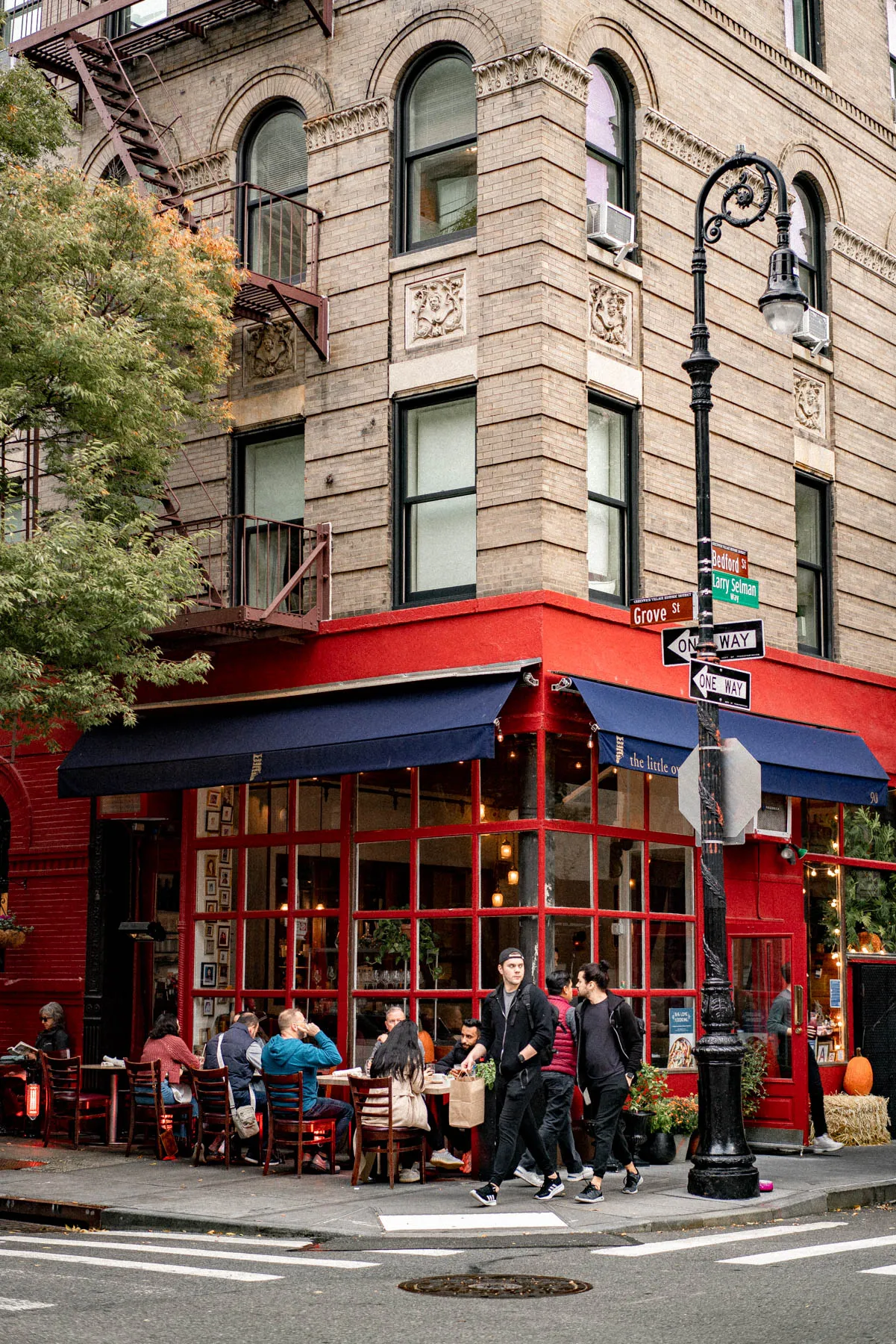 Cozy street scene in the West Village decorated for Christmas in NYC