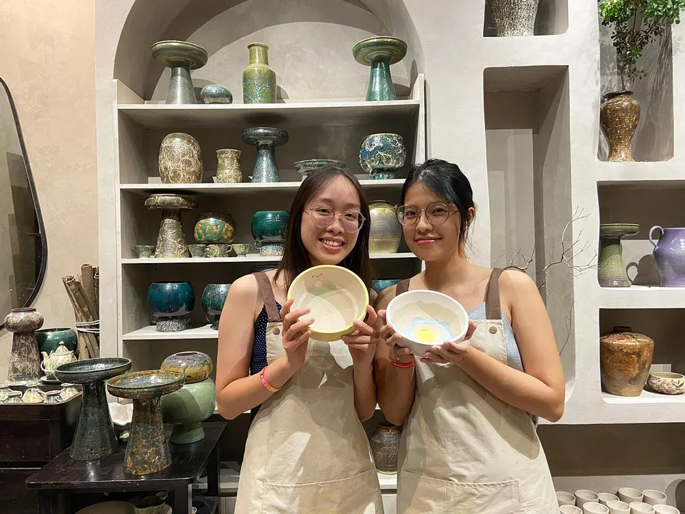Crafting pottery at Bat Trang Village near Hanoi, a traditional Vietnamese craft
