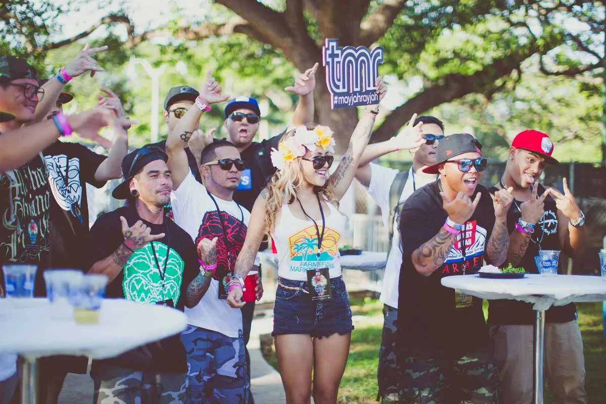 Crowd enjoying a music festival outdoors