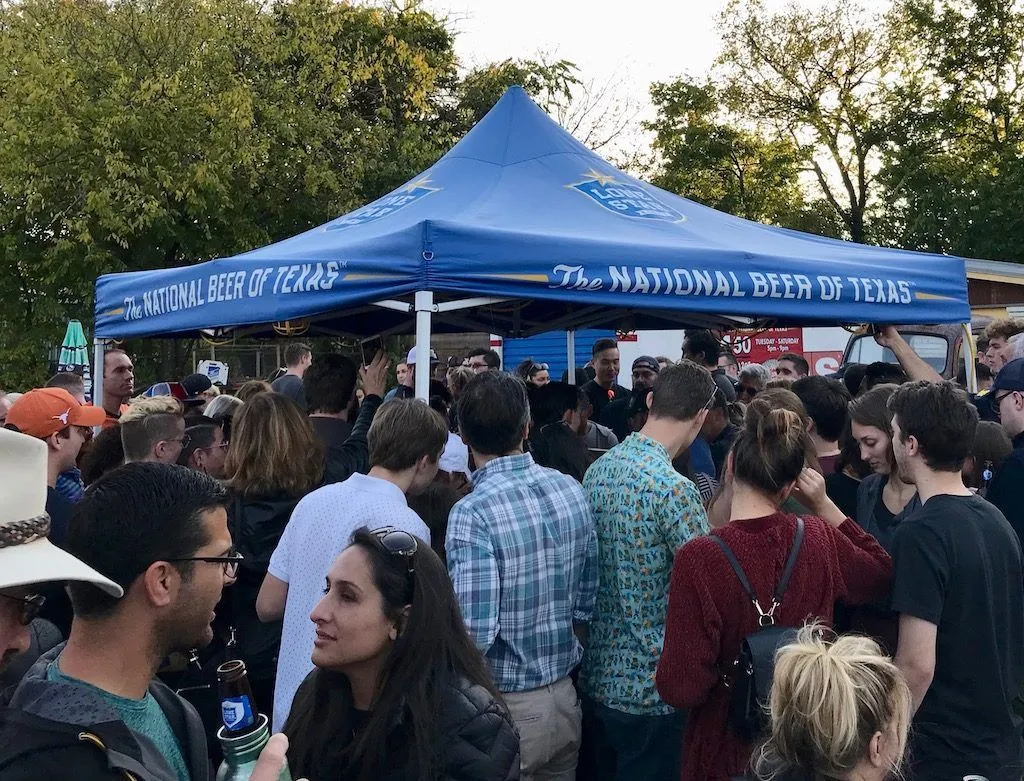 Crowd gathered outside the Little Longhorn Saloon in Austin for Chicken Shit Bingo