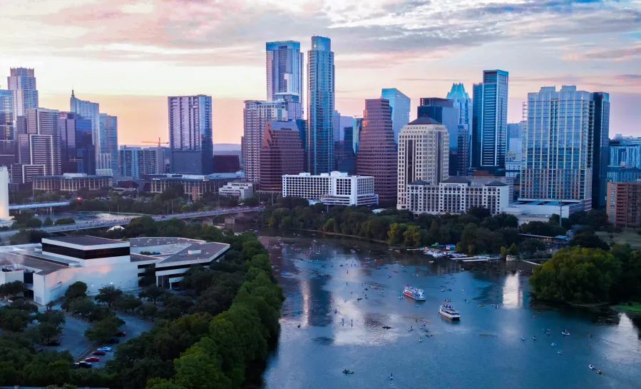 Crowds enjoying Austin's July 4th celebrations under the summer sky, reflecting the typical warm July weather