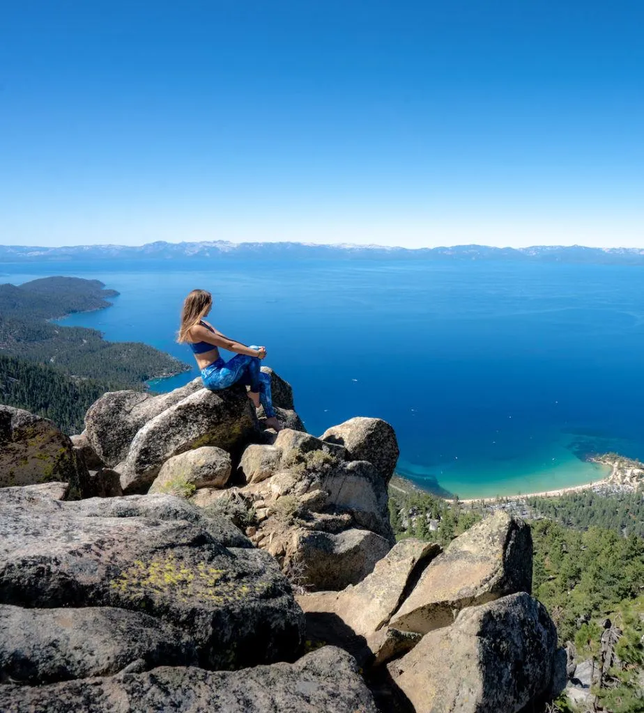 Crystal clear waters of Lake Tahoe from an overlook, perfect for outdoor-focused weekend trips for single women.