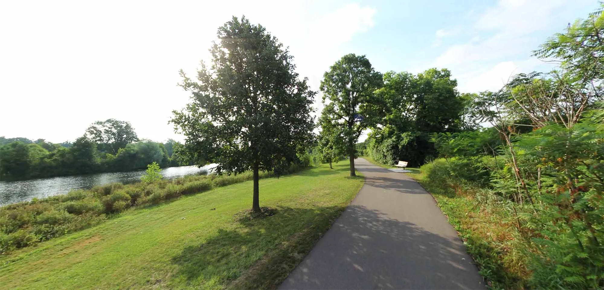 Cyclists and walkers on the paved Border-to-Border Trail in Washtenaw County